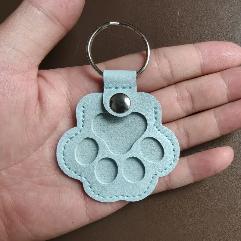 (🌲Early Christmas Sale- 49% OFF) Cats & Dogs Paw Shaped Leather Keychain